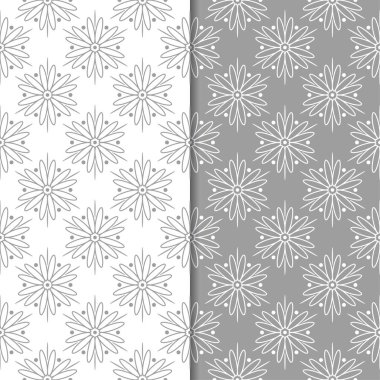 Beyaz ve gri çiçek arka planlar. Tekstil ve duvar kağıtları için dikişsiz desen seti