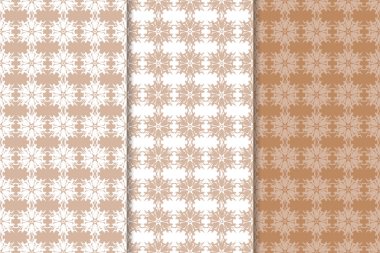 Kahverengi çiçek arka planlar. Tekstil ve duvar kağıtları için dikişsiz desen seti