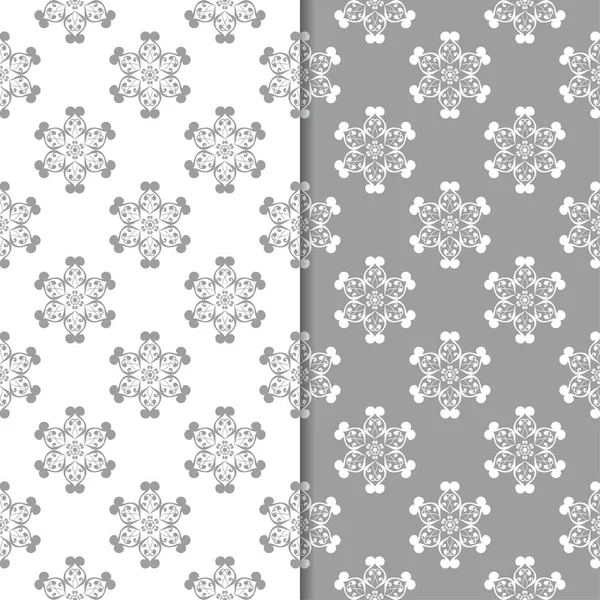 Beyaz ve gri çiçek arka planlar. Tekstil ve duvar kağıtları için dikişsiz desen seti