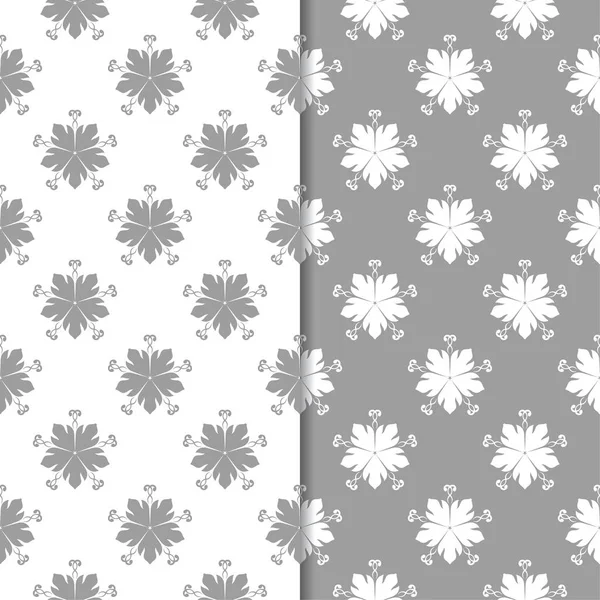 Beyaz ve gri çiçek süsler. Tekstil ve duvar kağıtları için sorunsuz arka planlar kümesi