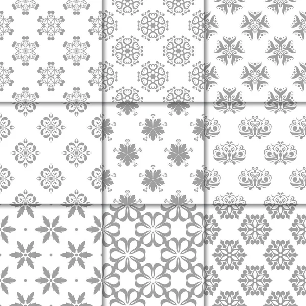Gri ve beyaz çiçekli süsler. Kağıt için tarafsız Dikişsiz desen koleksiyonu Tekstil
