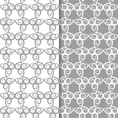 Beyaz ve gri çiçek süsler. Tekstil ve duvar kağıtları için sorunsuz arka planlar kümesi