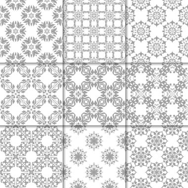 Gri ve beyaz çiçekli süsler. Kağıt için tarafsız Dikişsiz desen koleksiyonu Tekstil