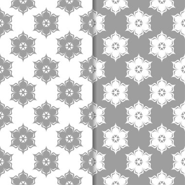 Beyaz ve gri çiçek süs tasarımlar. Tekstil ve duvar kağıtları için dikişsiz desen seti
