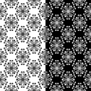 Siyah ve beyaz çiçek arka planlar. Tekstil ve duvar kağıtları için sorunsuz tasarım kümesi