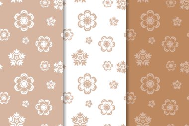 Kahverengi çiçek arka planlar. Tekstil ve duvar kağıtları için dikişsiz desen seti