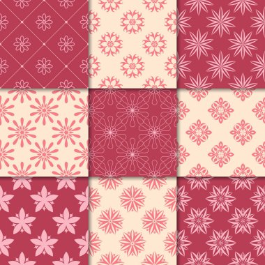 Kiraz kırmızı ve bej çiçekli süsler. Kağıt için dikişsiz desen koleksiyonu Tekstil