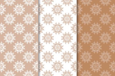 Kahverengi çiçek arka planlar. Tekstil ve duvar kağıtları için dikişsiz desen seti