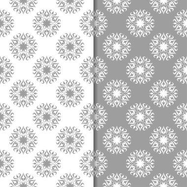 Beyaz ve gri arka plan çiçek kümesi. Tekstil ve duvar kağıtları için dikişsiz desen