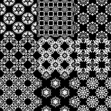 Siyah ve beyaz çiçekli süsler. Koleksiyon için kağıt, tek renkli Dikişsiz desen Tekstil