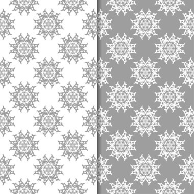 Beyaz ve gri çiçek arka planlar. Tekstil ve duvar kağıtları için dikişsiz desen seti