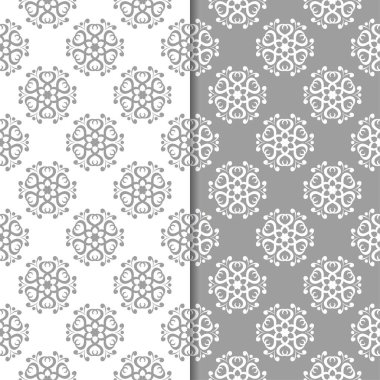 Beyaz ve gri arka plan çiçek kümesi. Tekstil ve duvar kağıtları için dikişsiz desen