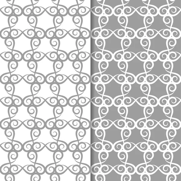 Beyaz ve gri çiçek süsler. Tekstil ve duvar kağıtları için sorunsuz arka planlar kümesi