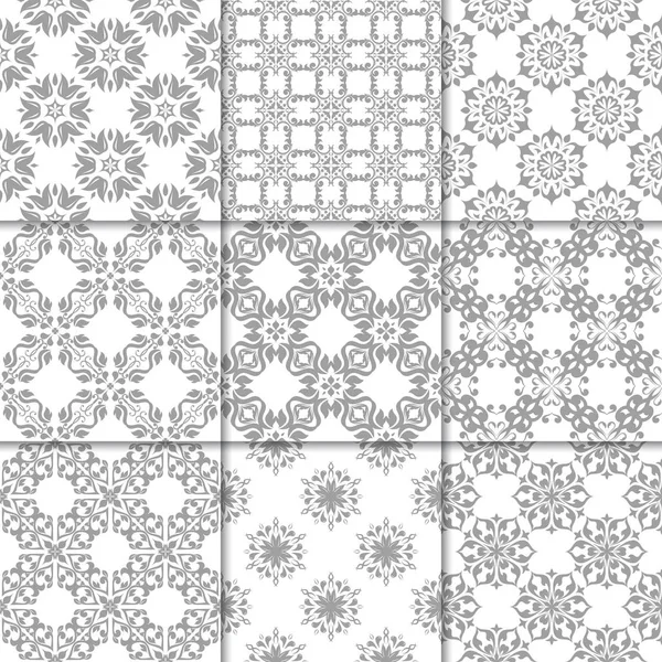 Gri ve beyaz çiçekli süsler. Kağıt için tarafsız Dikişsiz desen koleksiyonu Tekstil