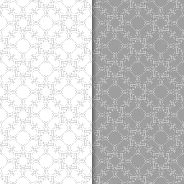 Beyaz ve gri çiçek süs tasarımlar. Tekstil ve duvar kağıtları için dikişsiz desen seti
