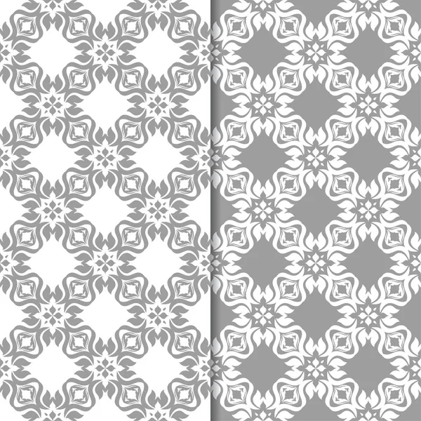 Beyaz ve gri çiçek süsler. Tekstil ve duvar kağıtları için sorunsuz arka planlar kümesi