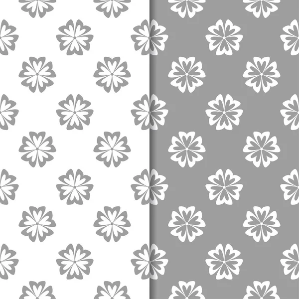 Beyaz ve gri çiçek süsler. Tekstil ve duvar kağıtları için sorunsuz arka planlar kümesi
