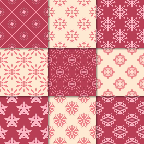 Kiraz kırmızı ve bej çiçekli süsler. Kağıt için dikişsiz desen koleksiyonu Tekstil