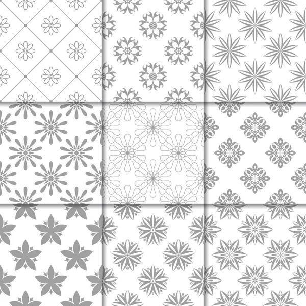 Gri ve beyaz çiçekli süsler. Kağıt için tarafsız Dikişsiz desen koleksiyonu Tekstil