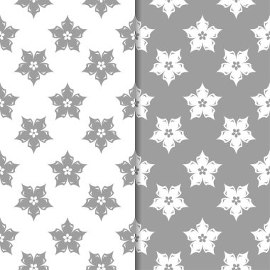 Beyaz ve gri arka plan çiçek kümesi. Tekstil ve duvar kağıtları için dikişsiz desen