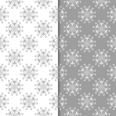 Beyaz ve gri çiçek arka planlar. Tekstil ve duvar kağıtları için dikişsiz desen seti