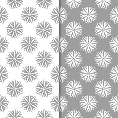 Beyaz ve gri çiçek arka planlar. Tekstil ve duvar kağıtları için dikişsiz desen seti