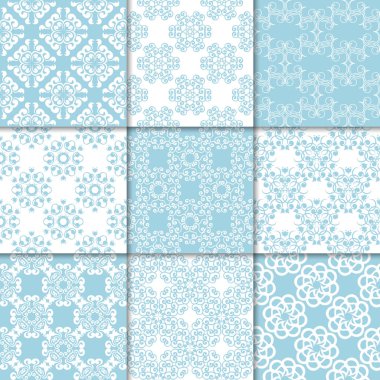 Mavi ve beyaz çiçekli süsler. Kağıt için dikişsiz desen koleksiyonu Tekstil