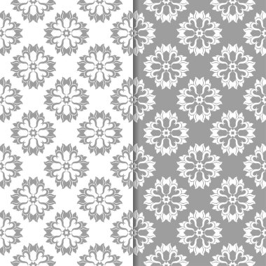 Beyaz ve gri çiçek arka planlar. Tekstil ve duvar kağıtları için dikişsiz desen seti