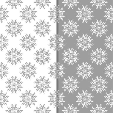Beyaz ve gri çiçek arka planlar. Tekstil ve duvar kağıtları için dikişsiz desen seti