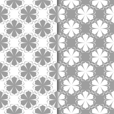 Beyaz ve gri çiçek süs tasarımlar. Tekstil ve duvar kağıtları için dikişsiz desen seti