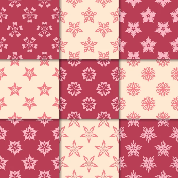 Kiraz kırmızı ve bej çiçekli süsler. Kağıt için dikişsiz desen koleksiyonu Tekstil