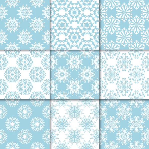 Mavi ve beyaz çiçekli süsler. Kağıt için dikişsiz desen koleksiyonu Tekstil