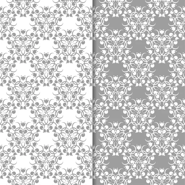 Beyaz ve gri çiçek süs tasarımlar. Tekstil ve duvar kağıtları için dikişsiz desen seti
