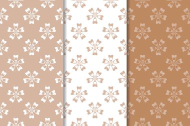 Kahverengi çiçek arka planlar. Tekstil ve duvar kağıtları için dikişsiz desen seti