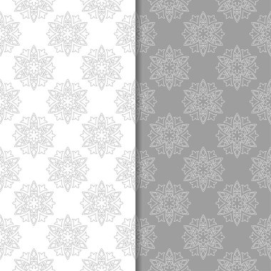 Beyaz ve gri çiçek süs tasarımlar. Tekstil ve duvar kağıtları için dikişsiz desen seti