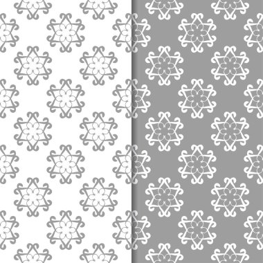Beyaz ve gri çiçek arka planlar. Tekstil ve duvar kağıtları için dikişsiz desen seti
