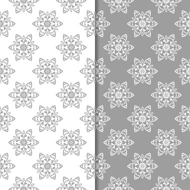 Beyaz ve gri arka plan çiçek kümesi. Tekstil ve duvar kağıtları için dikişsiz desen