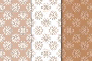 Kahverengi ve bej çiçek arka planlar kümesi. Tekstil ve duvar kağıtları için dikişsiz desen seti