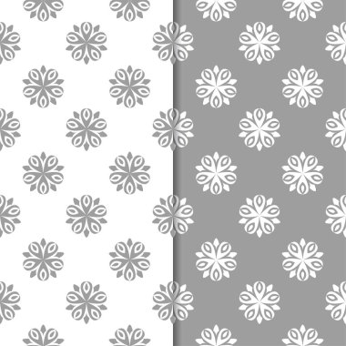 Beyaz ve gri çiçek arka planlar. Tekstil ve duvar kağıtları için dikişsiz desen seti