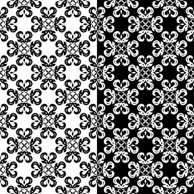 Siyah ve beyaz çiçekli süsler. Tekstil ve duvar kağıtları için sorunsuz arka planlar kümesi