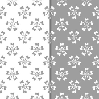 Beyaz ve gri çiçek arka planlar. Tekstil ve duvar kağıtları için dikişsiz desen seti