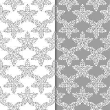 Beyaz ve gri çiçek süsler. Tekstil ve duvar kağıtları için sorunsuz arka planlar kümesi