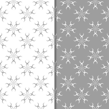 Beyaz ve gri çiçek arka planlar. Tekstil ve duvar kağıtları için dikişsiz desen seti