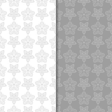 Beyaz ve gri çiçek arka planlar. Tekstil ve duvar kağıtları için dikişsiz desen seti