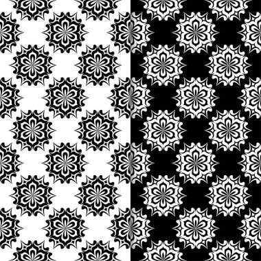 Siyah ve beyaz çiçekli süsler. Tekstil ve duvar kağıtları için sorunsuz arka planlar kümesi
