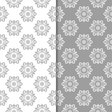 Beyaz ve gri arka plan çiçek kümesi. Tekstil ve duvar kağıtları için dikişsiz desen