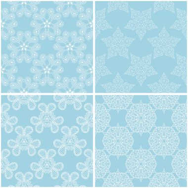 Çiçek desenleri. Mavi ve beyaz sorunsuz arka planlar kümesi. Vektör çizim