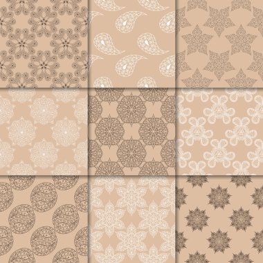 Kahverengi Bej çiçekli süsler. Kağıt için dikişsiz desen koleksiyonu Tekstil