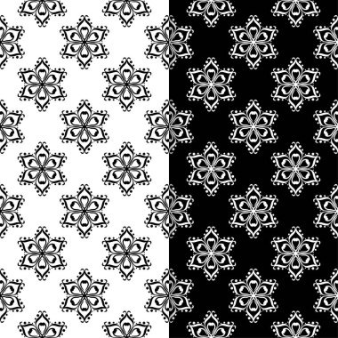 Siyah ve beyaz çiçekli süsler. Tekstil ve duvar kağıtları için sorunsuz arka planlar kümesi