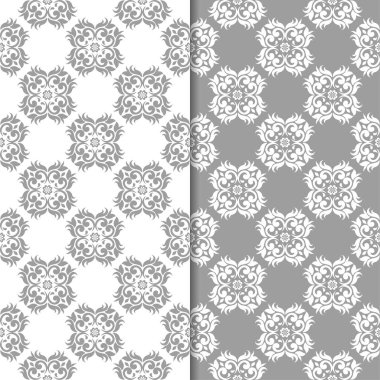 Beyaz ve gri arka plan çiçek kümesi. Tekstil ve duvar kağıtları için dikişsiz desen